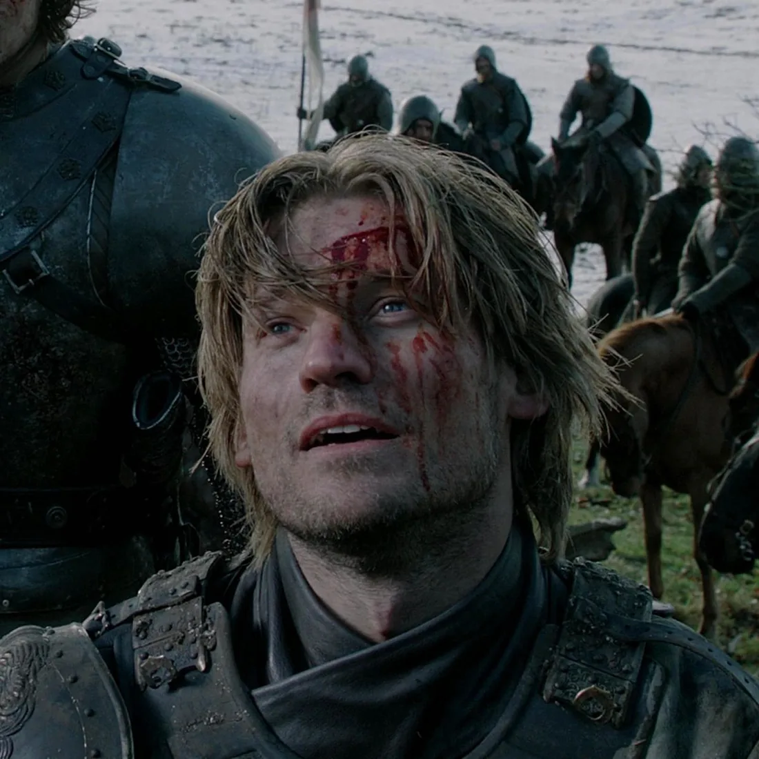 A bloodied Jaime Lannister looking upward.