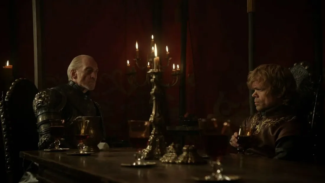 Tywin and Tyrion Lannister facing each other in a tense room.